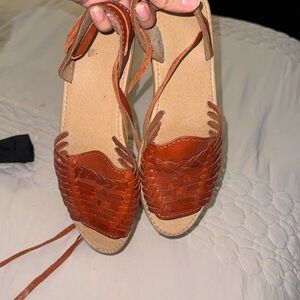 Women’s sandals. Leather with cross straps up leg